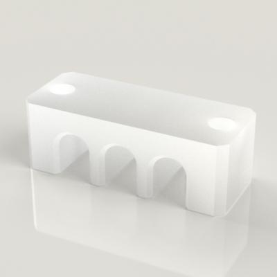 PTFE チューブ固定ブロックの樹脂加工の製作・見積もり事例